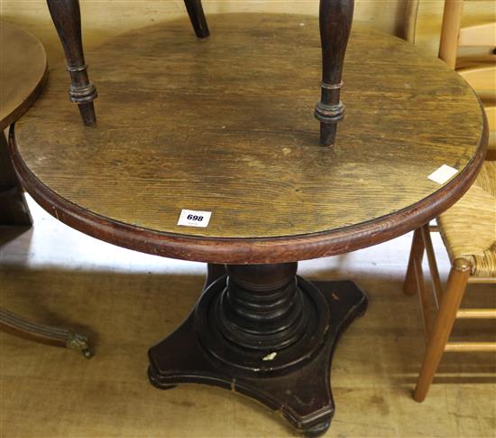 Circular oak topped dining table